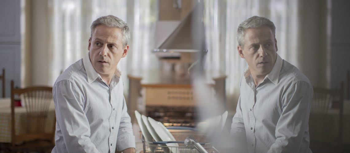 worried-man-looking-away-home